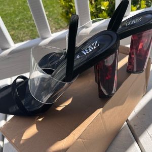 Black suede sandal heels with tortoise heels